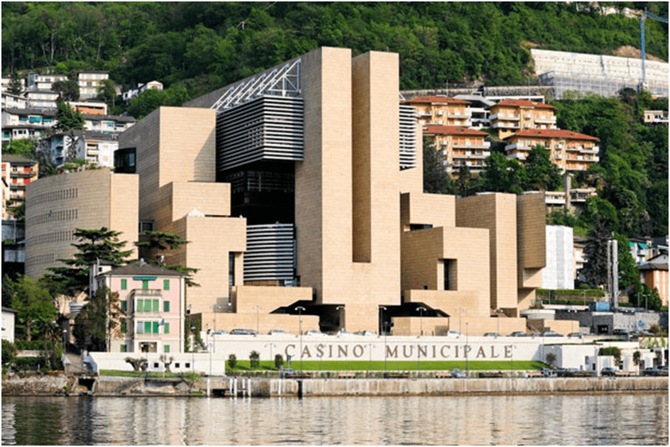 Paradigm shift in architecture: Post-Modern Architecture. Image shows one of the postmodern architecture buildings Italian cantons in Switzerland.
