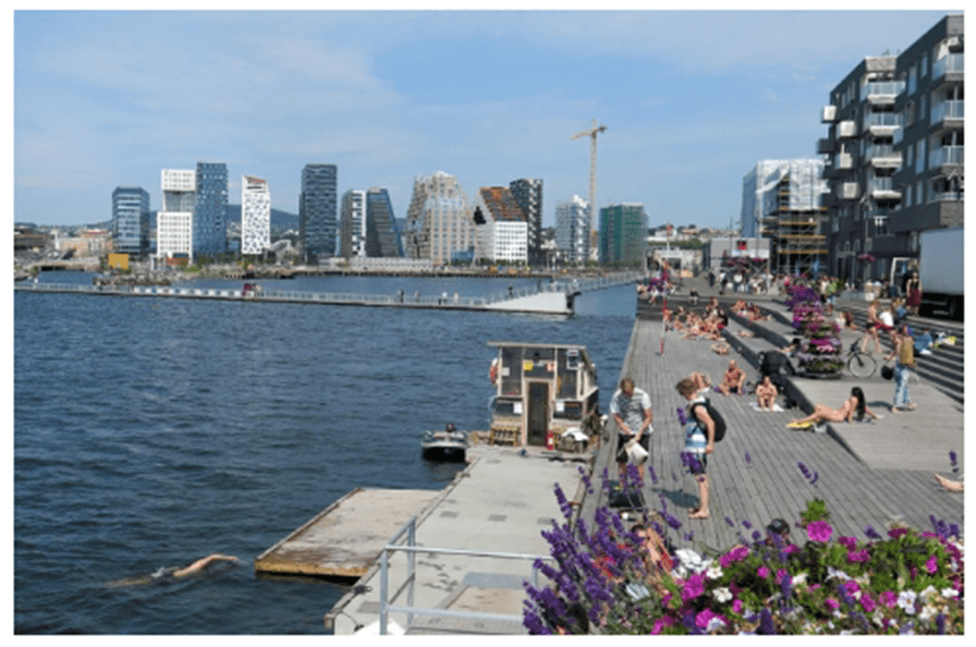 Fjord City: A Waterfront Urban Renewal Project in Oslo. photo shows Bjorvika waterfront, swimming area, open space and park, and high-rise buildings