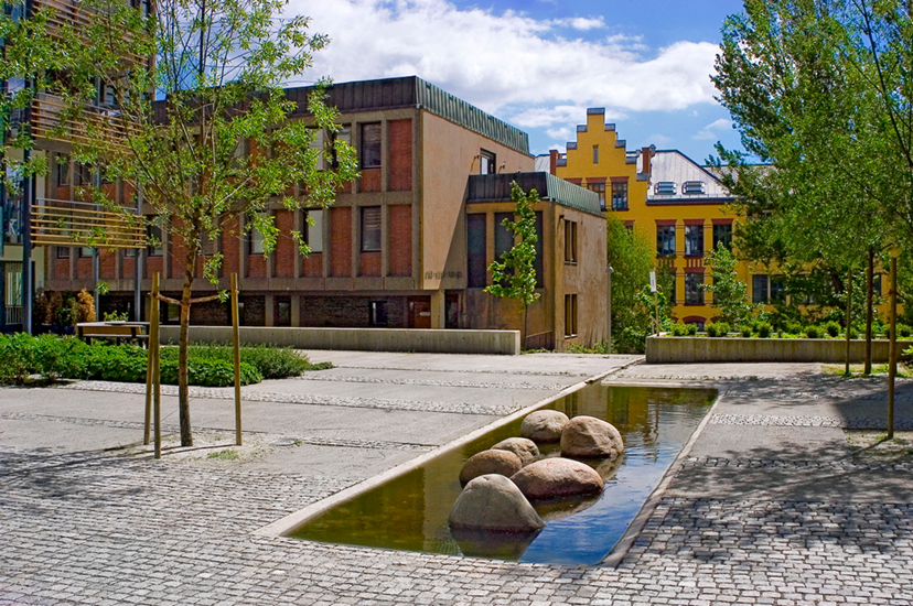 Pilestredet Park a sustainable urban development tale – Oslo. Image shows   landscape design of urban space and water features in the development. 