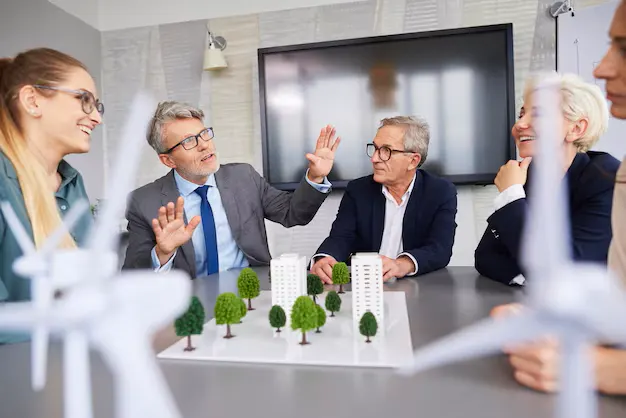 What is effective meeting management in architecture firm? shows the business meeting environment and type of staff.